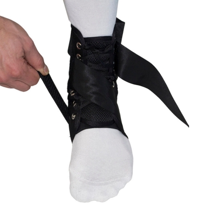 put on gladiator sports lightweight ankle support with straps step 1