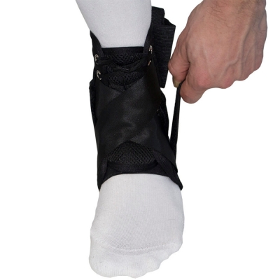 put on gladiator sports lightweight ankle support with straps step 2